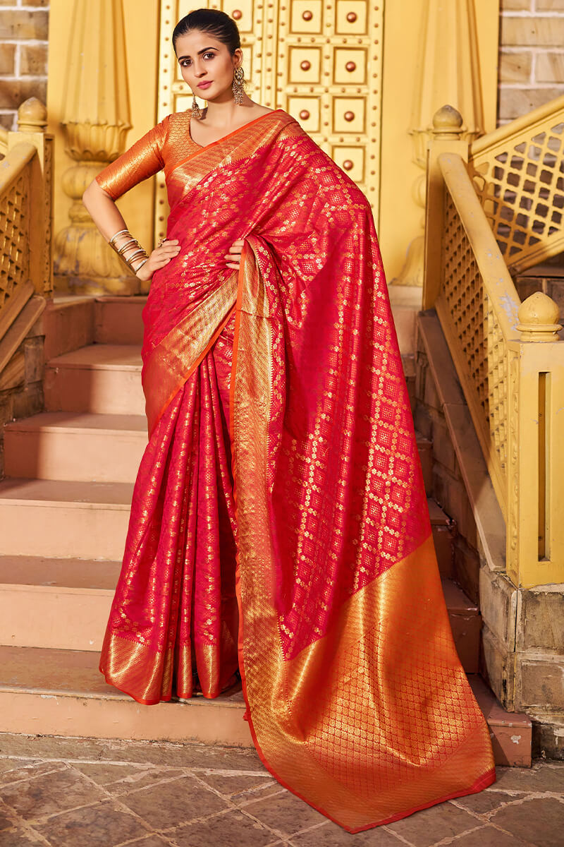 Mesmeric Red Patola Silk Saree with Fairytale Blouse Piece