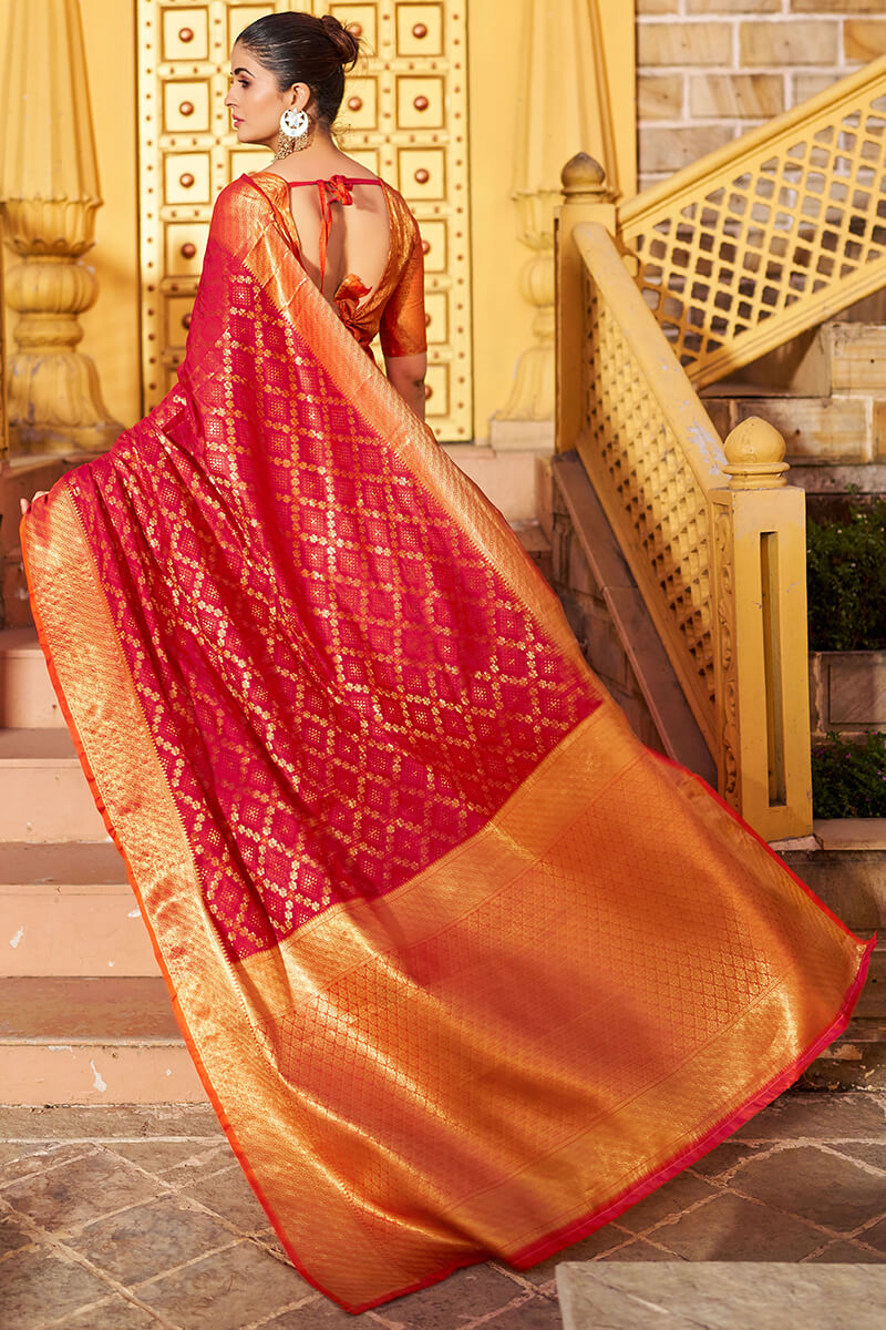 Mesmeric Red Patola Silk Saree with Fairytale Blouse Piece