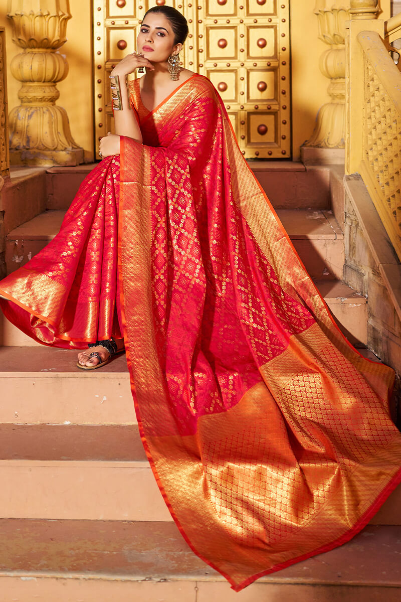 Mesmeric Red Patola Silk Saree with Fairytale Blouse Piece