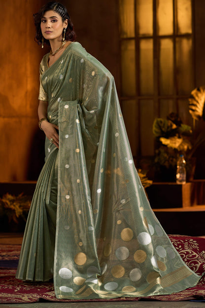 Murmurous Sea Green Soft Banarasi Tissue Silk Saree With Enticing Blouse Piece