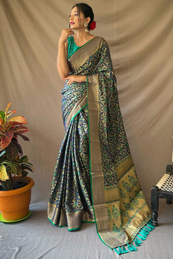 Precious Navy Blue Patola Silk Saree with Nectarous Blouse Piece