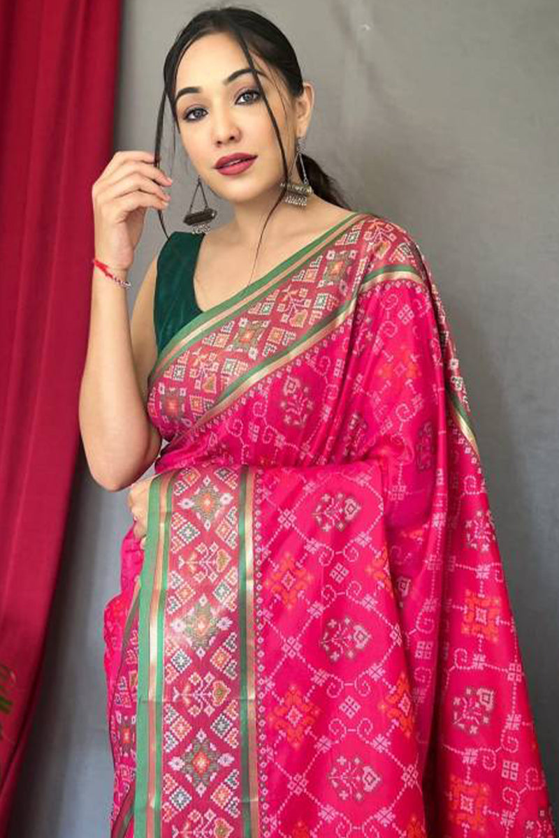 Incomparable Dark Pink Patola Silk Saree with Fairytale Blouse Piece
