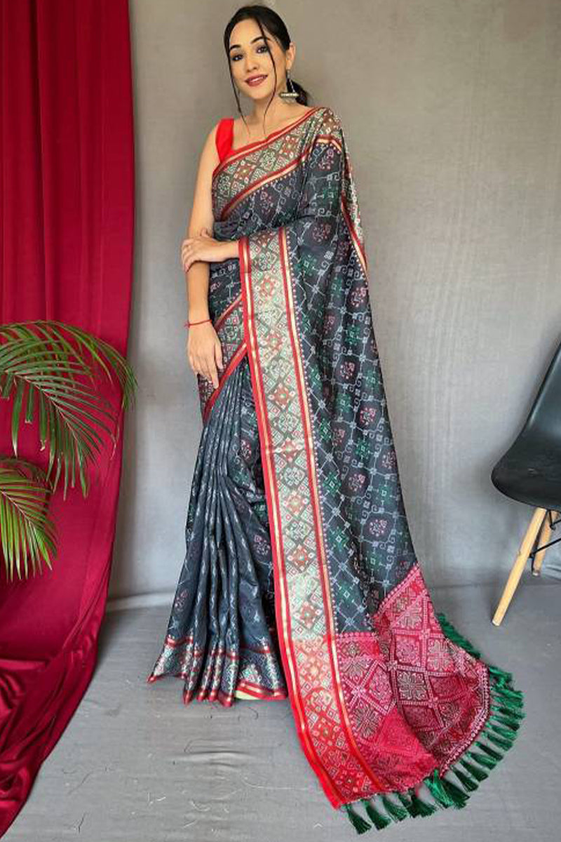 Piquant Grey Patola Silk Saree with Sempiternal Blouse Piece