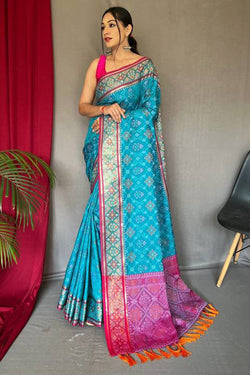 Whimsical Rama Patola Silk Saree with Amazing Blouse Piece