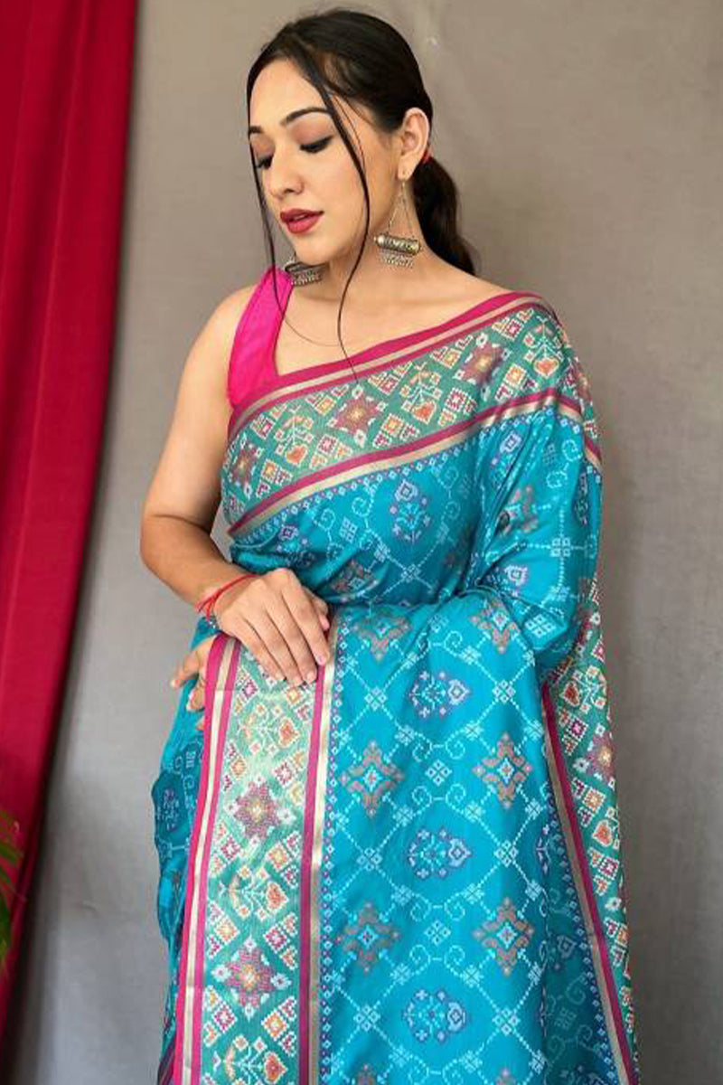 Whimsical Rama Patola Silk Saree with Amazing Blouse Piece
