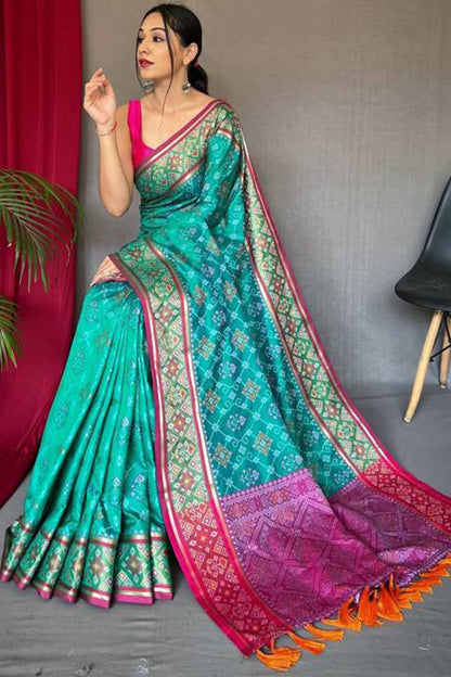 Serendipity Turquoise Patola Silk Saree with Luxuriant Blouse Piece