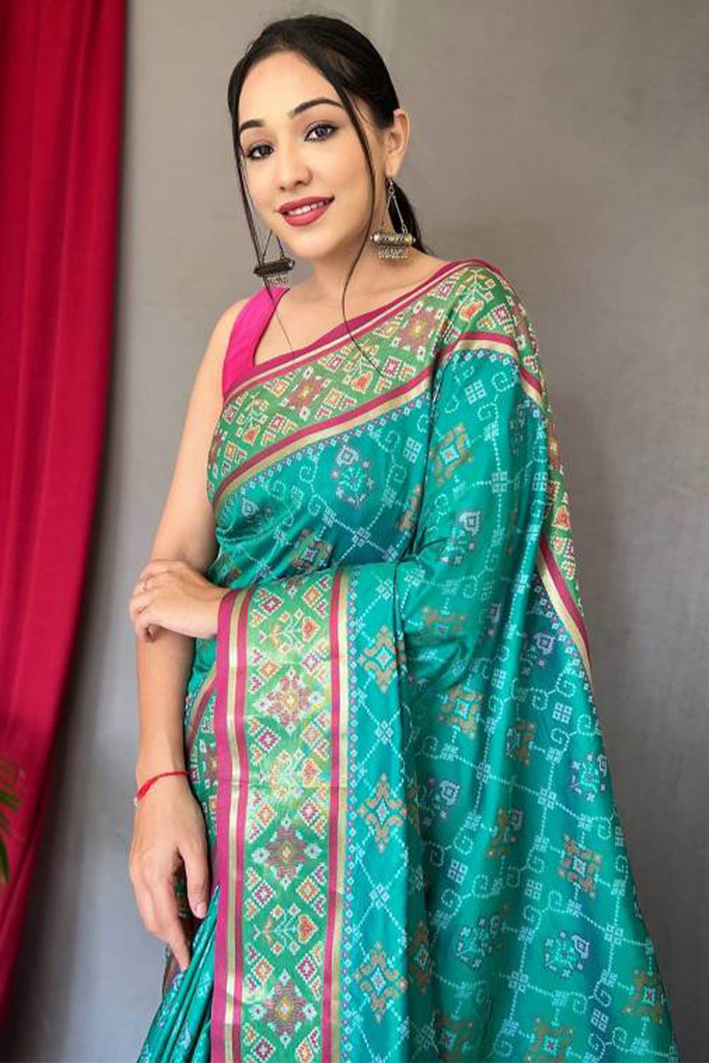 Serendipity Turquoise Patola Silk Saree with Luxuriant Blouse Piece