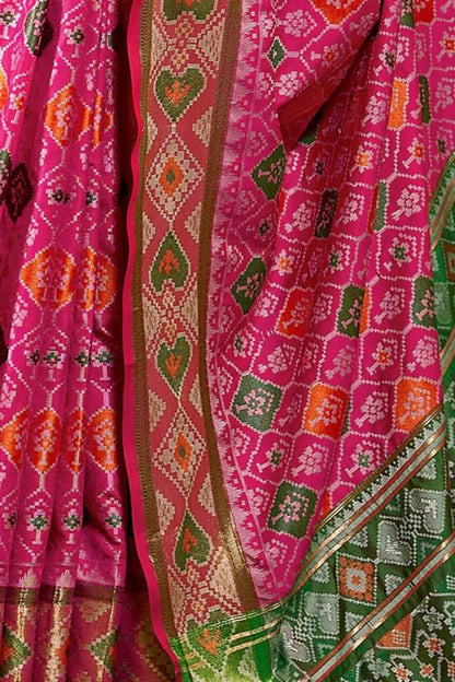 Vivacious Dark Pink Patola Silk Saree with Hypnotic Blouse Piece