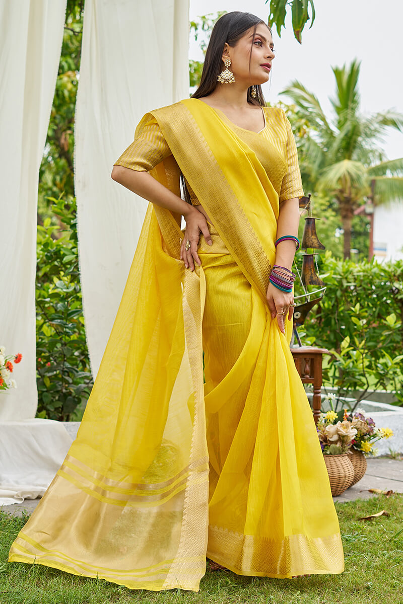 Opulent Yellow Cotton Silk Saree With Charming Blouse Piece