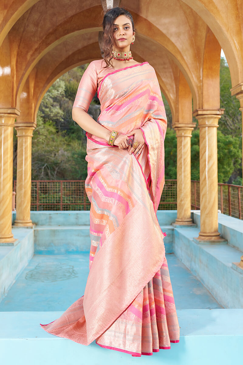 Mesmerising Pink Organza Silk Saree With Delightful Blouse Piece