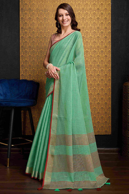 Deserving Sea Green Cotton Silk Saree With Ethereal Blouse Piece