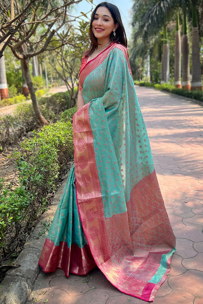 Sonorous Firozi Soft Banarasi Tissue Silk Saree With Brood Blouse Piece