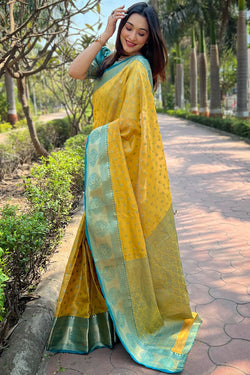 Eye-catching Yellow Soft Banarasi Tissue Silk Saree With Cynosure Blouse Piece