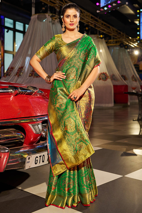 Load image into Gallery viewer, Fancifull Dark Green Kanjivaram Silk Saree With Inspiring Blouse Piece
