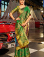 Fancifull Dark Green Kanjivaram Silk Saree With Inspiring Blouse Piece