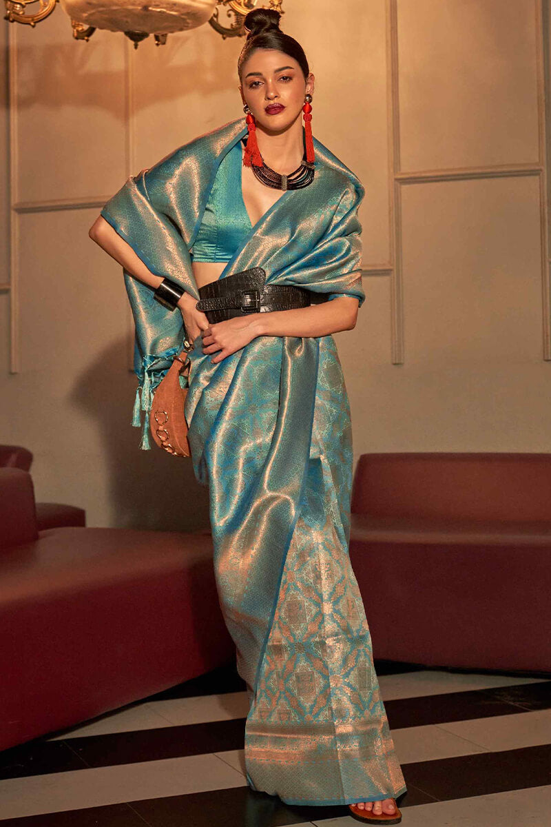 Flattering Turquoise Kanjivaram Silk Saree With Pretty Blouse Piece