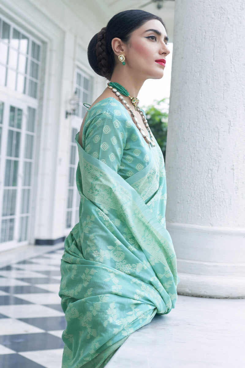 Twirling Turquoise Lucknowi Silk Saree and Inspiring Blouse Piece