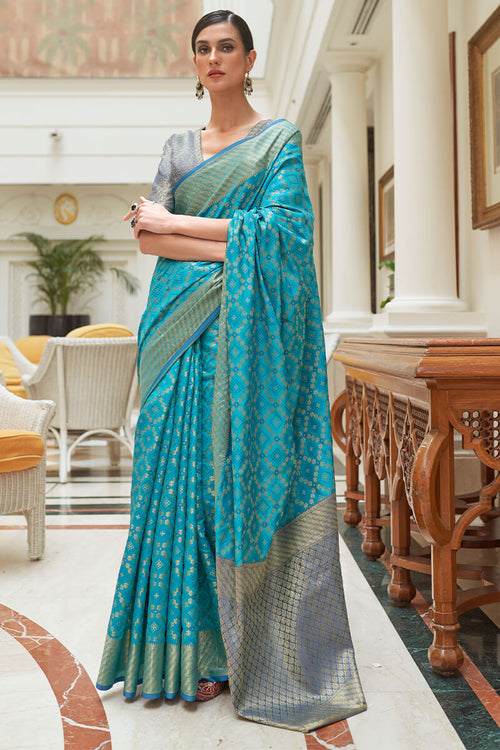 Load image into Gallery viewer, Sumptuous Firozi Soft Patola Silk Saree with Palimpsest Blouse Piece
