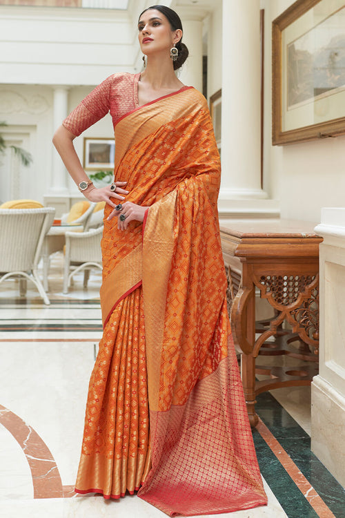 Load image into Gallery viewer, Embrocation Orange Soft Patola Silk Saree with Brood Blouse Piece
