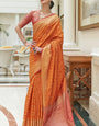 Embrocation Orange Soft Patola Silk Saree with Brood Blouse Piece