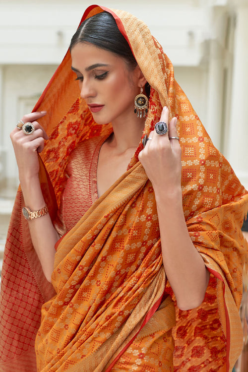 Load image into Gallery viewer, Embrocation Orange Soft Patola Silk Saree with Brood Blouse Piece
