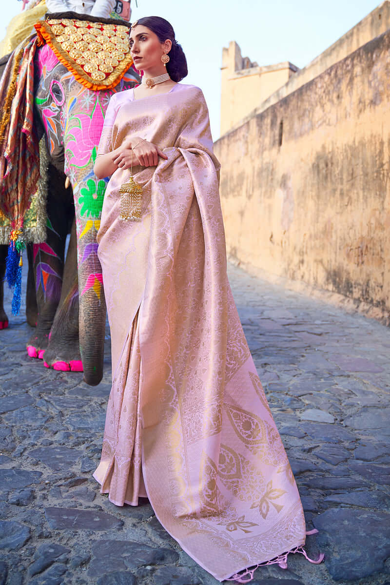 Prominent Baby Pink Kanjivaram Silk Saree with Entrancing Blouse Piece