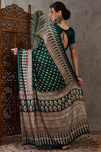 Gratifying Dark Green Ajrakh Printed Semi Modal Silk Saree With Entrancing Blouse Piece