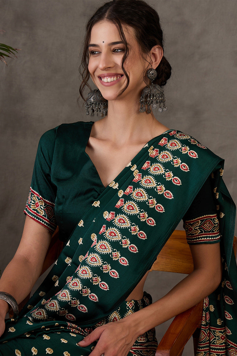 Gratifying Dark Green Ajrakh Printed Semi Modal Silk Saree With Entrancing Blouse Piece