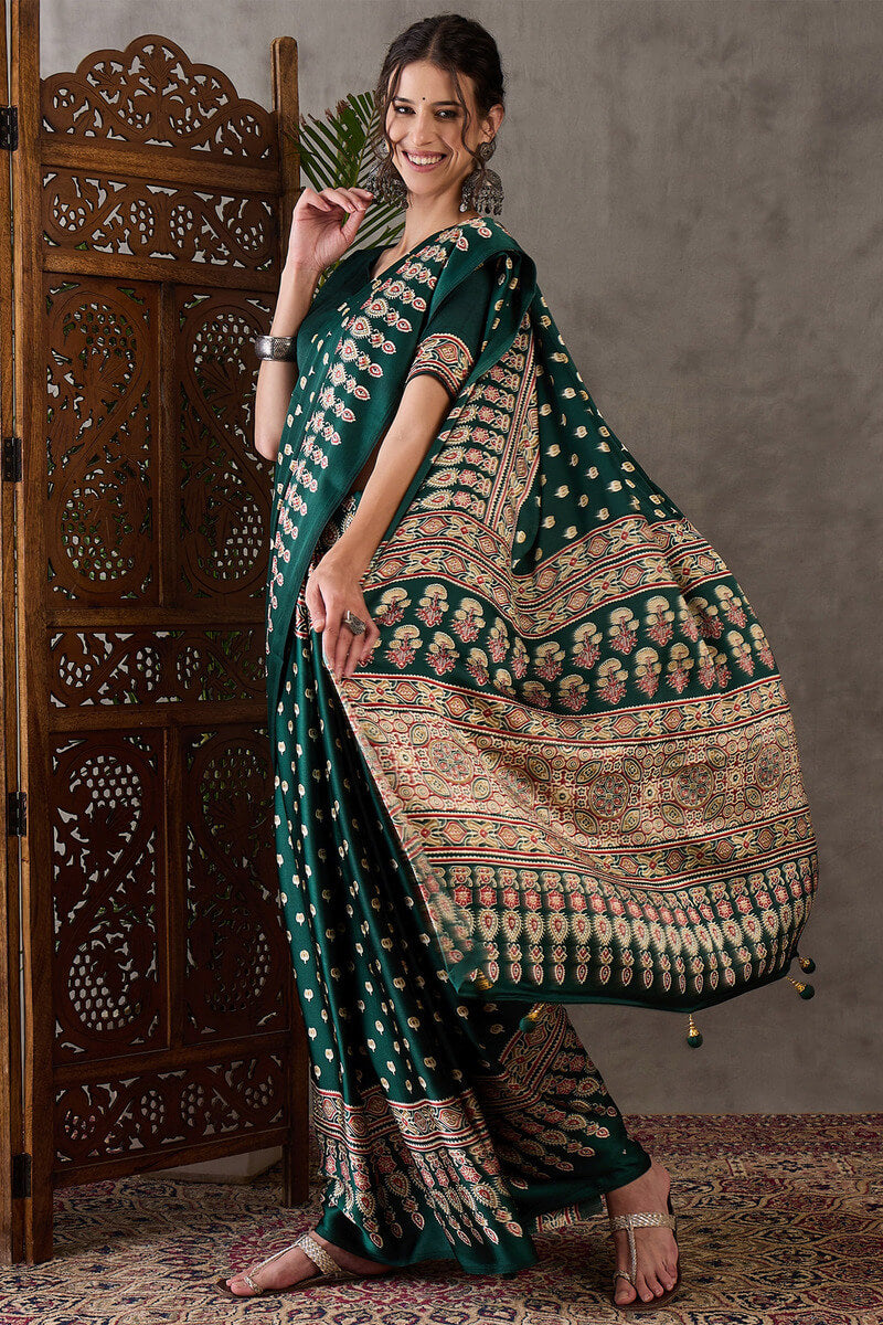 Gratifying Dark Green Ajrakh Printed Semi Modal Silk Saree With Entrancing Blouse Piece