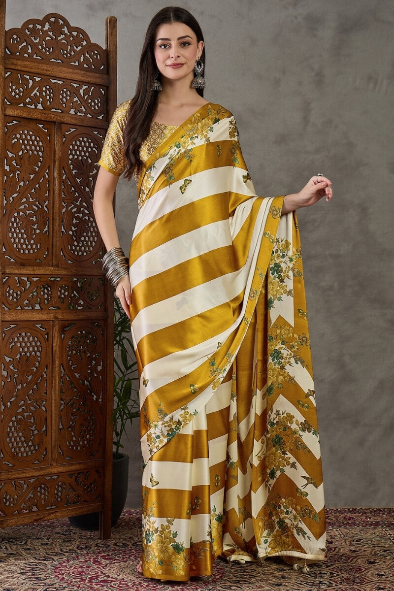 Super extravagant Mustard Ajrakh Printed Semi Modal Silk Saree With Demesne Blouse Piece