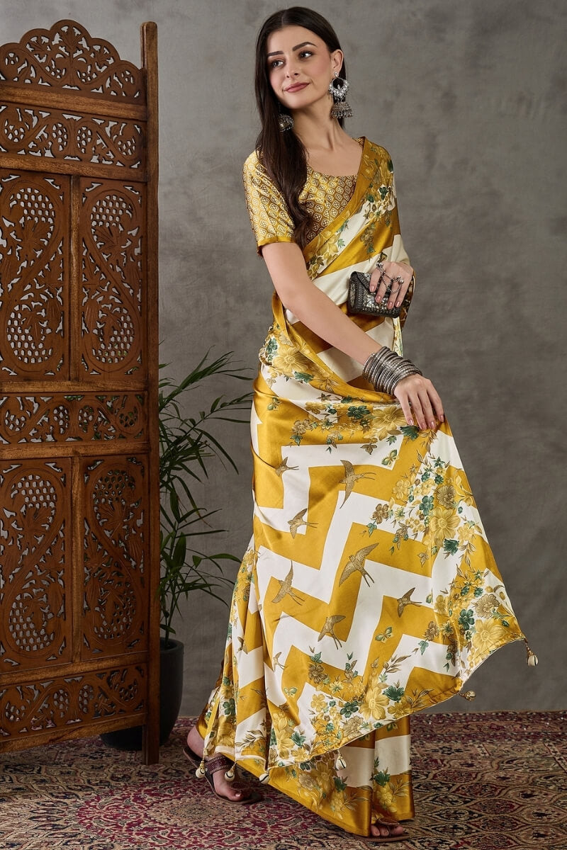 Super extravagant Mustard Ajrakh Printed Semi Modal Silk Saree With Demesne Blouse Piece