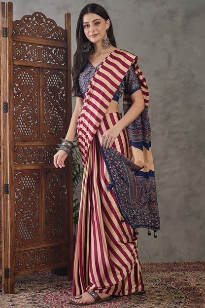 Prominent Maroon Ajrakh Printed Semi Modal Silk Saree With Engaging Blouse Piece