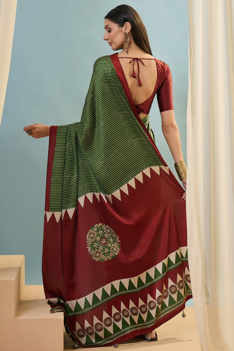 Transcendent Dark Green Ajrakh Printed Semi Modal Silk Saree With Winsome Blouse Piece