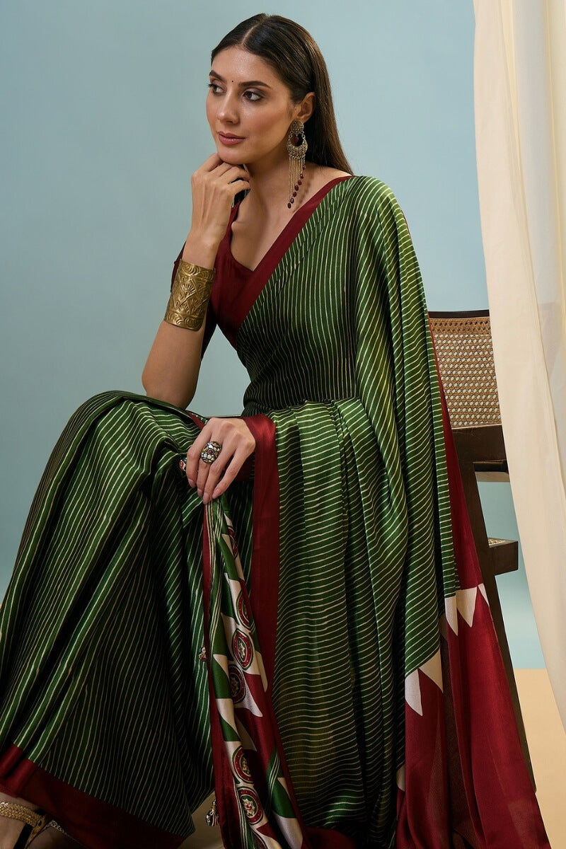 Transcendent Dark Green Ajrakh Printed Semi Modal Silk Saree With Winsome Blouse Piece