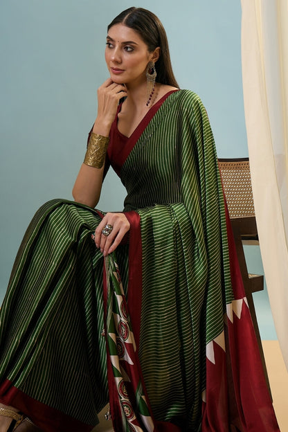 Transcendent Dark Green Ajrakh Printed Semi Modal Silk Saree With Winsome Blouse Piece