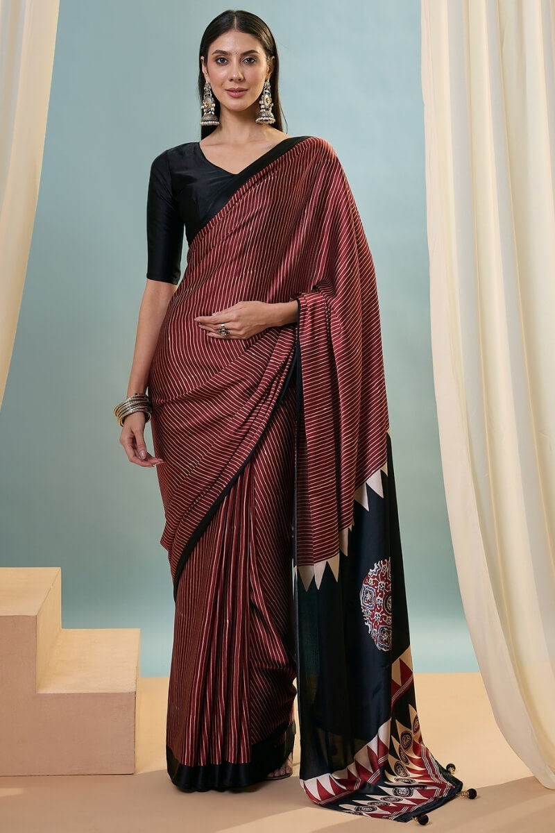 Enthralling Maroon Ajrakh Printed Semi Modal Silk Saree With Desuetude Blouse Piece
