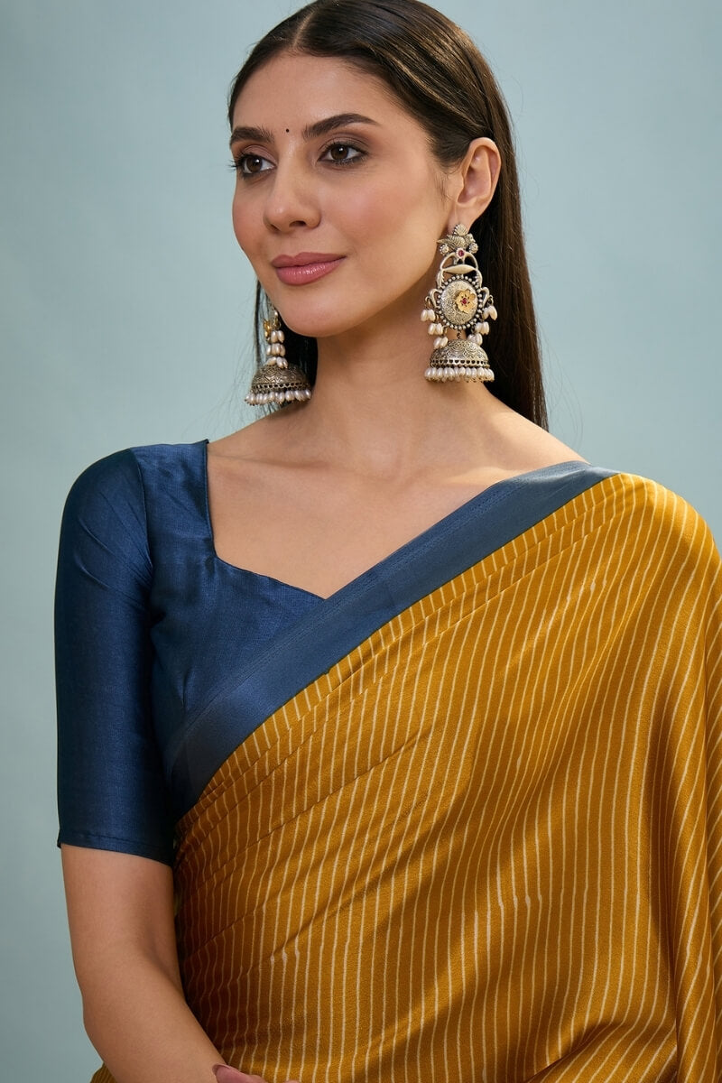 Flattering Mustard Ajrakh Printed Semi Modal Silk Saree With Beautiful Blouse Piece
