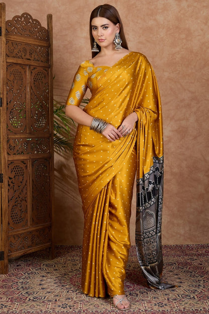 Adorning Mustard Ajrakh Printed Semi Modal Silk Saree With Tantalizing Blouse Piece