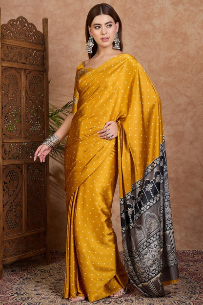 Adorning Mustard Ajrakh Printed Semi Modal Silk Saree With Tantalizing Blouse Piece