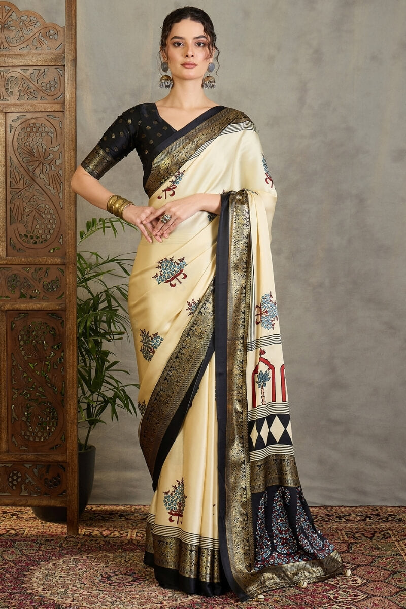 Pulsating Off White Ajrakh Printed Semi Modal Silk Saree With Forbearance Blouse Piece