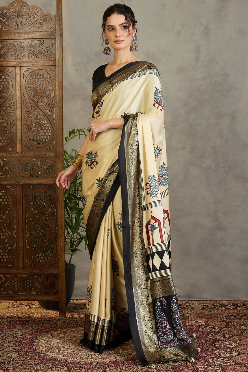 Pulsating Off White Ajrakh Printed Semi Modal Silk Saree With Forbearance Blouse Piece