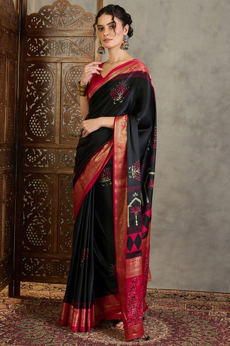 Adoring Black Ajrakh Printed Semi Modal Silk Saree With Nectarous Blouse Piece