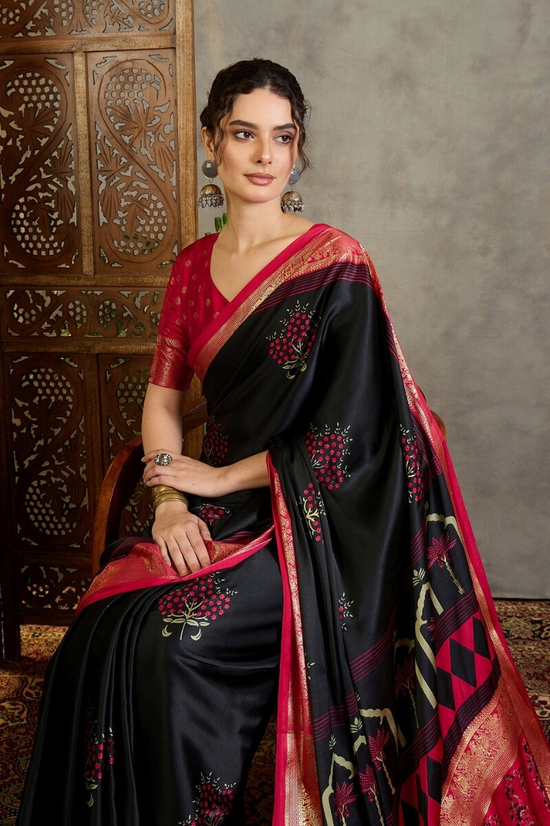 Adoring Black Ajrakh Printed Semi Modal Silk Saree With Nectarous Blouse Piece