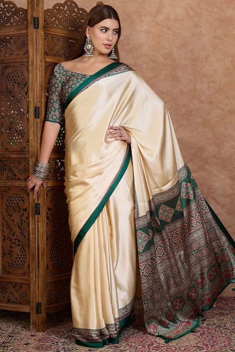 Redolent Off White Ajrakh Printed Semi Modal Silk Saree With Gleaming Blouse Piece