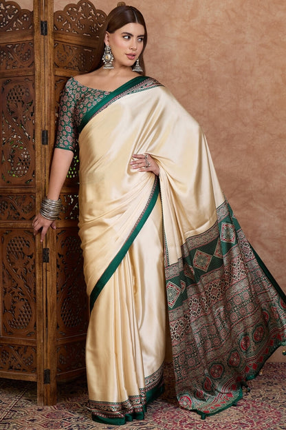 Redolent Off White Ajrakh Printed Semi Modal Silk Saree With Gleaming Blouse Piece