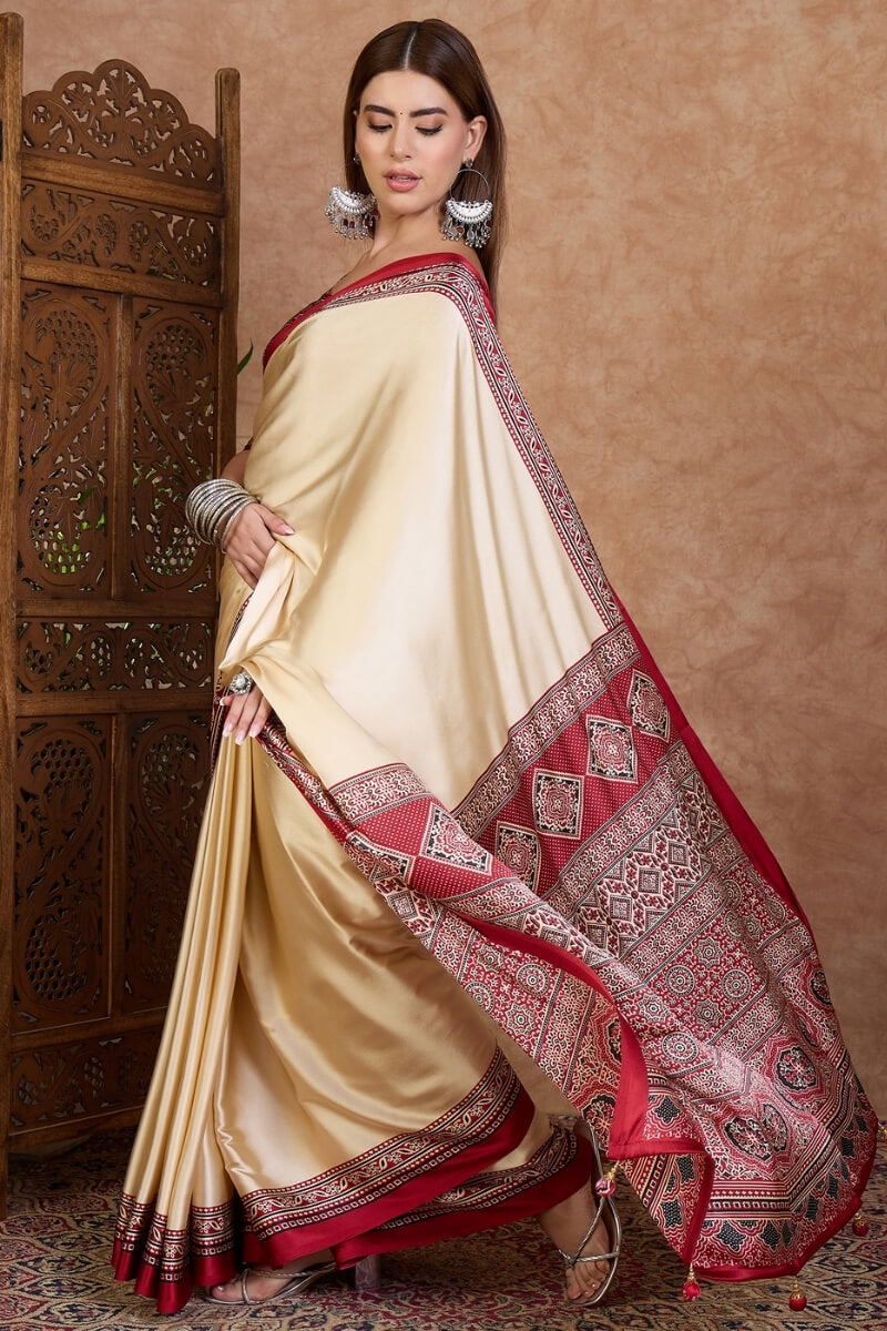 Invaluable Off White Ajrakh Printed Semi Modal Silk Saree With Capricious Blouse Piece
