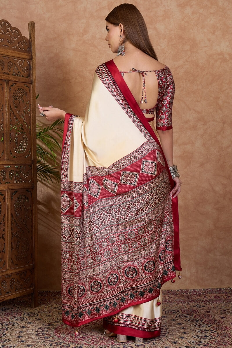 Invaluable Off White Ajrakh Printed Semi Modal Silk Saree With Capricious Blouse Piece