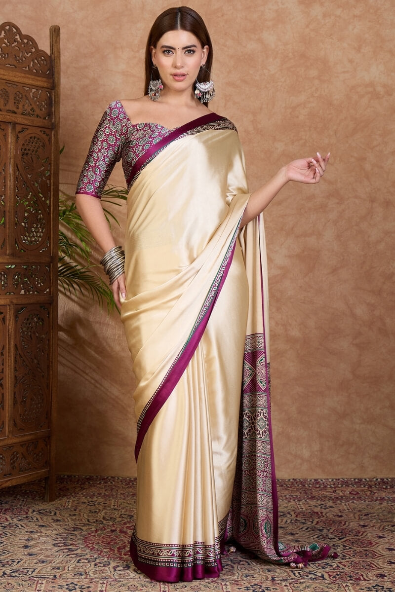 Twirling Off White Ajrakh Printed Semi Modal Silk Saree With Piquant Blouse Piece