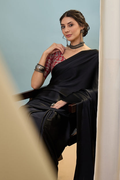 Innovative Black Ajrakh Printed Semi Modal Silk Saree With Snazzy Blouse Piece