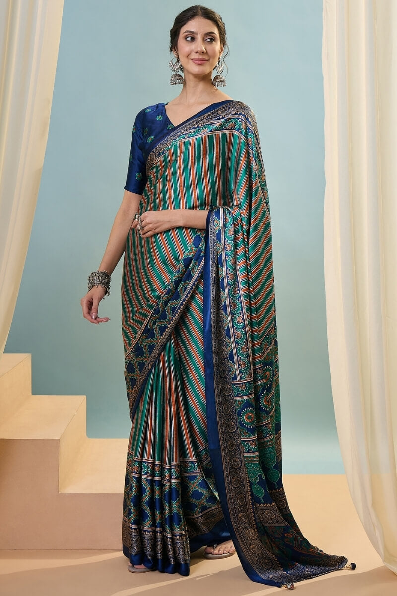 Sonorous Dark Green Ajrakh Printed Semi Modal Silk Saree With Breathtaking Blouse Piece